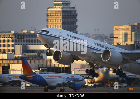 Los Angeles, California, USA. 15th June, 2019. An Air China Cargo Boeing 777 takes off from Los Angeles International Airport headed for Beijing. Credit: KC Alfred/ZUMA Wire/Alamy Live News Stock Photo