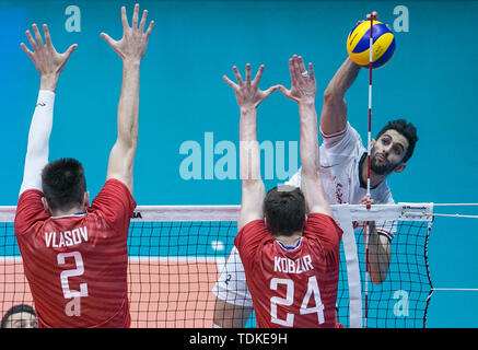 Urmia, Iran. 16th June, 2019. Ivan Iakovlev (C) of Russia celebrates ...