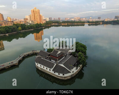 (190617) -- BEIJING, June 17, 2019 (Xinhua) -- Aerial photo taken on May 17, 2016 shows the Yanshui Pavilion in Jiujiang City, east China's Jiangxi Province. Jiangxi Province is located in eastern China along the southern shore of Yangtze River with abundant resources and mild climate. Surrounded by majestic mountains, the province is also known for the Poyang Lake, China's largest freshwater lake. Jiangxi has made great efforts in ecological development and building national ecological civilization pilot zone. On June 16-18, the Beijing International Horticultural Exhibition displays Jiangx Stock Photo