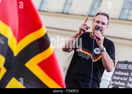 Munich, Bavaria, Germany. 17th June, 2019. MICHAEL STUERZENBERGER appearing at a Buergerbewegung Pax Europa far-right demonstration in Munich, Germany with the symbolic Wirmer flag in the foreground. Headed by the Verfassungsschutz (Secret Service) monitored Michael Stuerzenberger, the Buergerbewegung Pax Europa (Citizen Initiative Pax Europa) islamophobic group marched through the University area of Munich, Germany. Despite claiming to be for Judeo-Christian culture, the group had numerous known anti-semites, anti-semitic conspiracy theorists, and right-extremists among their 50 followers. Cr Stock Photo