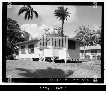 Oblique exterior view of rear and south side, with Facility 32 beyond on right - U.S. Naval Base, Pearl Harbor, Chief Petty Officer's Quarters, 31 Belleau Wood Loop, Pearl City, Honolulu County, HI Stock Photo