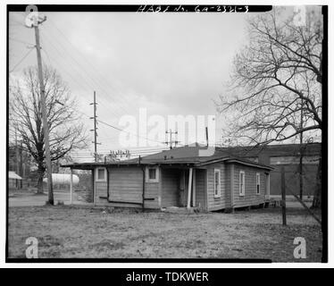 Oblique view of 217 Division Street, looking northeast, showing rear (west) facade and south side, Fairbanks Company appears at right - 217 Division Street (House), Rome, Floyd County, GA Stock Photo