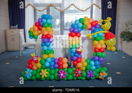 Ten letters of colorful balloons. Very beautiful 10 essays made from balloons for birthdays .figure ten of color balloons against the background Stock Photo