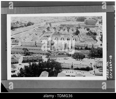 PHOTOCOPY OF PHOTOGRAPH (from Directorate of Facilities Engineering, HQ Presidio of San Francisco, California 94129) AERIAL VIEW OF LETTERMAN GENERAL HOSPITAL LOOKING SOUTHEAST PRIOR TO DEMOLITION OF ORIGINAL COMPLEX BUILDINGS, NURSES' QUARTERS VISIBLE IN RIGHT CENTER, 1974. - Letterman General Hospital, Nurses' Quarters, Girard Road and Lincoln Boulevard, Presidio of San Francisco, San Francisco, San Francisco County, CA Stock Photo