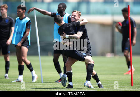 England's Phil Foden (centre left) and James Maddison during a training session at A.C. Sammaurese, San Mauro, Italy. Stock Photo