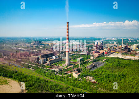 Industrial landscape with heavy pollution produced by a large factory Stock Photo