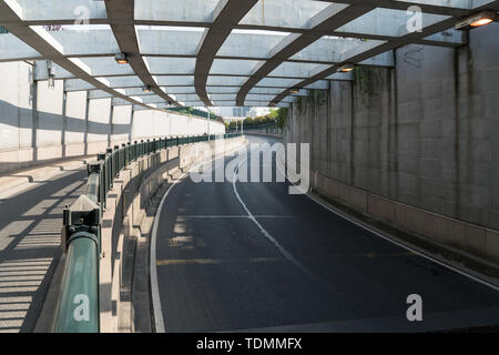 Turning tunnel in the city,road background Stock Photo