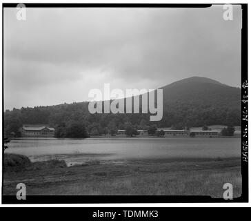 Peaks of Otter, Abbott Lake. View across lake to peaks of Outter Lodge, completed in 1964. Construction of the lake got underway in 1964. Looking east-northeast. - Blue Ridge Parkway, Between Shenandoah National Park and Great Smoky Mountains, Asheville, Buncombe County, NC Stock Photo