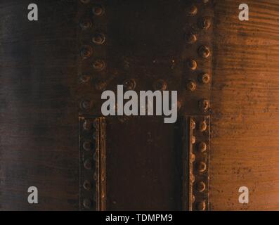 Close up shot of a big rusty tank with bolt fixed with metal pieces Stock Photo