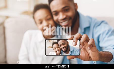 Selfie With Dad. Father And Daughter Taking Photo On Phone Stock Photo