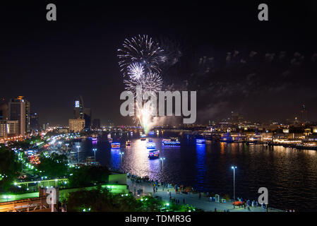Dubai, United Arab Emirates - June 4, 2019: Fireworks over Dubai creek in Deira to celebrate the end of Ramadan in Dubai, UAE Stock Photo
