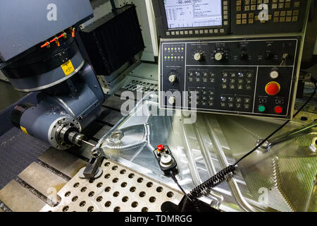 Measuring process with ruby touch probe on large CNC milling machine in jog mode. Stock Photo