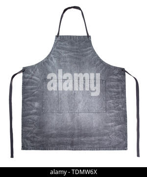 Dark gray jeans apron on white background. Clean gray denim apron isolated on white with clipping path. Stock Photo