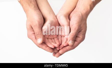 Father and daughter holding something in hands Stock Photo