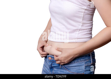 asian woman body fat belly side view and hand squeezing excess fat isolate on white background , clipping path include Stock Photo