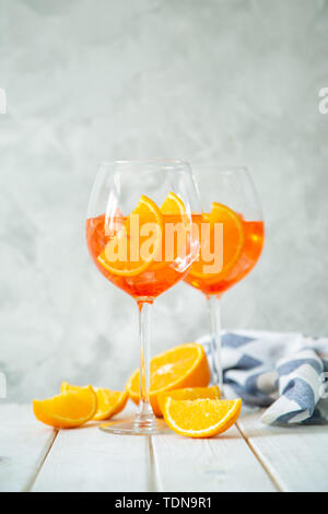 Aperol and ingredients drinks on wood background Stock Photo