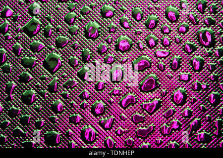 Silver Reflective Fabric Material Texture with Imitation of Water Droplets . Abstract Background of a Reflector Fabric for Lighting Equipment. Stock Photo