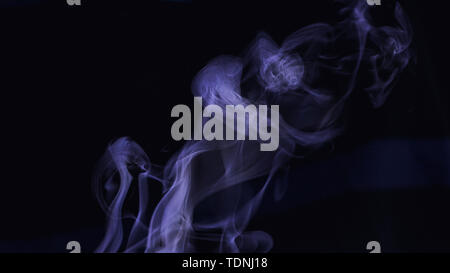 Smoke background on black with blue colors Stock Photo