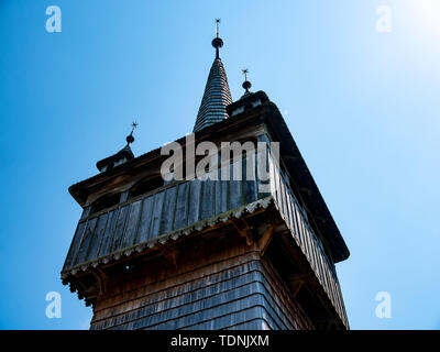 View on the bell tower of a calvinistic reformed church on a sunny day in Szentedre, Hungary. Stock Photo