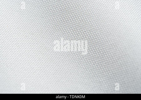 White Nylon Fabric Texture Background. Thick Fabric for Backpacks and Sports Equipment Stock Photo