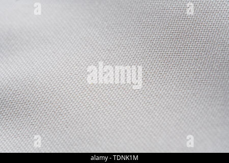 White Nylon Fabric Texture Background. Thick Fabric for Backpacks and Sports Equipment Stock Photo