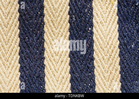 Herringbone tweed background with close up on fabric texture. Striped blue and white material Stock Photo