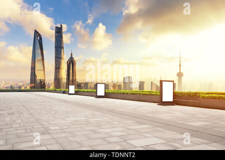 cityscape and skyline of shanghai from empty brick floor Stock Photo