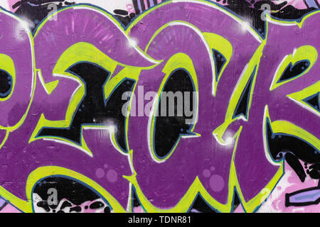 Abstract beautiful street art colorful graffiti style closeup. Detail of a wall. Can be useful for backgrounds. Modern iconic urban culture youth Stock Photo