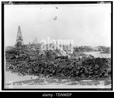 Photocopy of Photograph (original in Roger Lewis' private collection). Photographer and date unknown. MILNER DAM, TWIN FALLS COUNTY, MILNER, IDAHO; CENTER DAM IN CONSTRUCTION, WOODEN CORE IN FOREGROUND. - Milner Dam and Main Canal- Twin Falls Canal Company, On Snake River, 11 miles West of city of Burley, Idaho, Twin Falls, Twin Falls County, ID Stock Photo