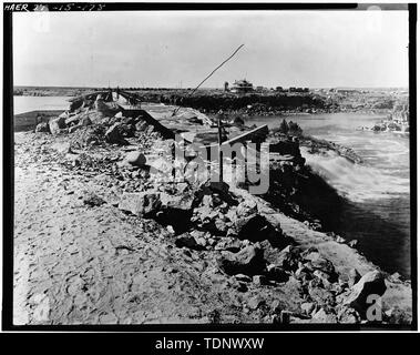 Photocopy of Photograph, Twin Falls Canal Company. C. R. Savage, Photographer, March, 1905. FIRST FULL WATER OVER MILNER DAM, TWIN FALLS COUNTY, MILNER, IDAHO; SOUTHWEST VIEW OF SPILLWAY GATES. - Milner Dam and Main Canal- Twin Falls Canal Company, On Snake River, 11 miles West of city of Burley, Idaho, Twin Falls, Twin Falls County, ID Stock Photo