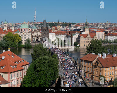 Prague, Czech Republic - June 8 2019: Charles Bridge across River Vltava in Prague Crowded with Tourists on a Summer Day, Aerial View Stock Photo