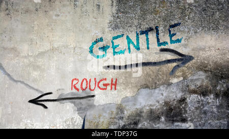 Wall Graffiti the Direction Way to Gentle versus Rough Stock Photo