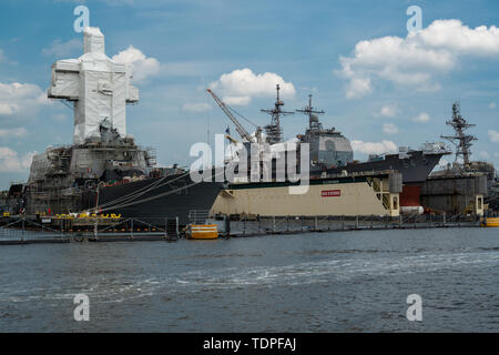 Norfolk, VA, USA -- June 6, 2019. Navy ships are berthed in Norfolk, VA for maintenance and repair. Stock Photo