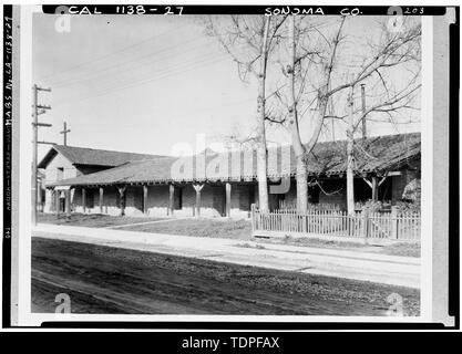 (from San Francisco Chronicle Library, San Francisco, California, c. 1930 (?) EXTERIOR, GENERAL VIEW OF CONVENTO, FRONT VIEW, AFTER RESTORATION - Mission San Francisco Solano de Sonoma, First and Spain Streets, Sonoma, Sonoma County, CA Stock Photo