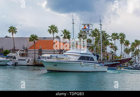 ORENJASTAD, ARUBA - November 19, 2016: Being south of the hurricane belt and because of the constant breeze, temperatures and little rain, Aruba is a  Stock Photo