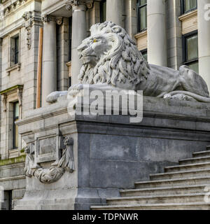 Lion statue outside Vancouver Art Gallery beside steps; Vancouver, British Columbia, Canada Stock Photo