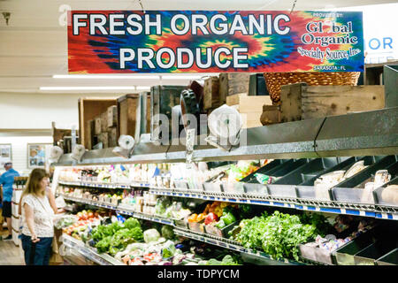 Sanibel Island Florida,Bailey's General Store,grocery store supermarket,inside interior,organic produce,vegetables,salads,woman female women,shopping Stock Photo