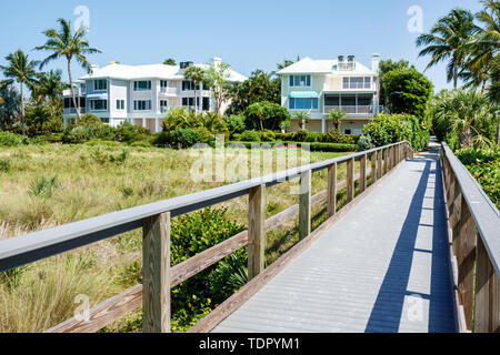 Sanibel Island Florida,East Gulf Drive,oceanfront beachfront homes,large single-family houses,multi-story,dune,access boardwalk,FL190509005 Stock Photo