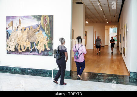 Orlando Florida,Museum of Art,inside interior,gallery galleries,exhibit,Black Blacks African Africans ethnic minority,adult adults woman women female Stock Photo