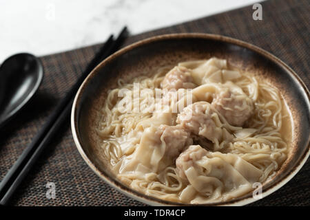 Cloud noodles on a marble table. Stock Photo