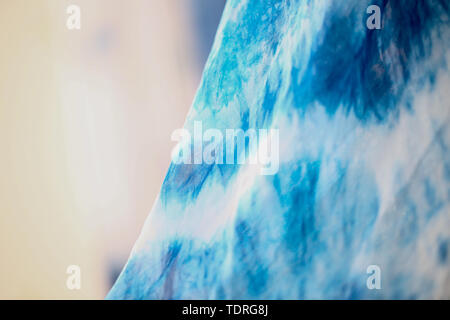 Batik braid glowing dots abstract background Stock Photo