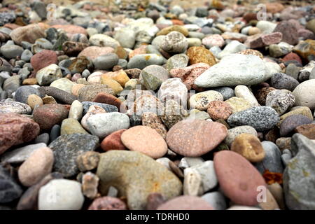 Decorative Round Stones, Abstract Smooth Round Pebbles on a Beach, Pebbles Sea Texture Background, Ocean Wet Stones, Multicolored Pebbles, Sea shore,  Stock Photo
