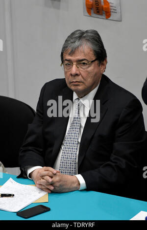 London, UK. 17th June, 2019. Colombian's foreign minister Carlos Holmes Trujillo is seen in the community event in Southbank University in London during the Colombia president official visit. Colombian community meet in South Bank University with Colombian President Ivan Duque as part of the official visit to London. Assistants to the meeting asked questions to the president about fracking, environmental issues, the peace process implementation, and questioning the risk that social leaders are in the country. Credit: SOPA Images Limited/Alamy Live News Stock Photo