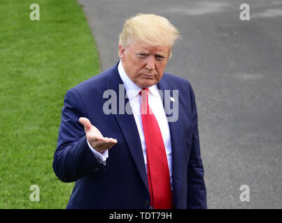 Washington, District of Columbia, USA. 18th June, 2019. United States President Donald J. Trump takes questions from the media as he walks from the Oval Office as he prepares to depart the South Lawn of the White House in Washington, DC for Orlando Florida where the President will formally announce he is a candidate for re-election on Tuesday. June 18, 2019 Credit: Ron Sachs/CNP/ZUMA Wire/Alamy Live News Stock Photo