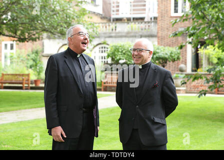 Outgoing Dean of Westminster, The Very Reverend Dr John Hall (left), who retires on November 1, after 13 years at Westminster Abbey, with the Very Reverend Dr David Hoyle - who has been appointed the new Dean of Westminster, and will be installed on November 16 - during a photo call at Westminster Abbey, London. Stock Photo