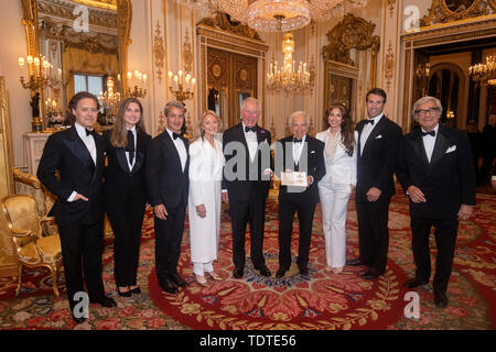 The Prince of Wales (centre) presents designer Ralph Lauren (fourth right) with his honorary KBE (Knight Commander of the Order of the British Empire) for Services to Fashion in a private ceremony at Buckingham Palace. Stock Photo