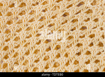 Dark Yellow Knitting Texture or Knitted Texture Background in macro style. Knitting Texture or Knitted Texture in vintage style for design Stock Photo