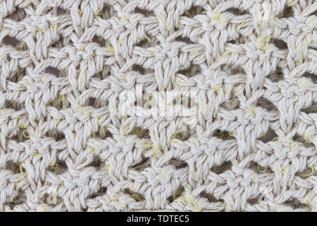Yellow Knitting Texture or Knitted Texture Background in macro style. Knitting Texture or Knitted Texture in vintage style for design Stock Photo