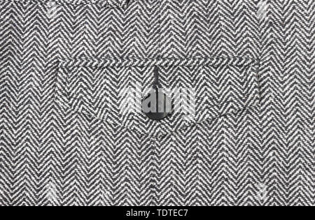 1 Black Button on Zig Zag Pattern or Triangle Pattern on Center Frame. 1 Button on Zig Zag Pattern or Triangle Pattern for apparel design Stock Photo