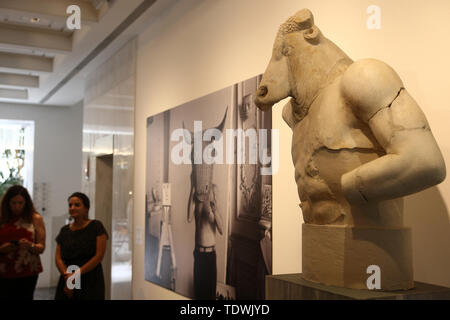 Athens, Greece. 19th June, 2019. Visitors are seen at the media preview of 'Picasso and Antiquity. Line and Clay' at the Museum of Cycladic Art in Athens, Greece, June 19, 2019. A rare exhibition about Pablo Picasso and his inspiration from ancient Greek art is to open here at the Museum of Cycladic Art on Thursday. Credit: Marios Lolos/Xinhua/Alamy Live News Stock Photo